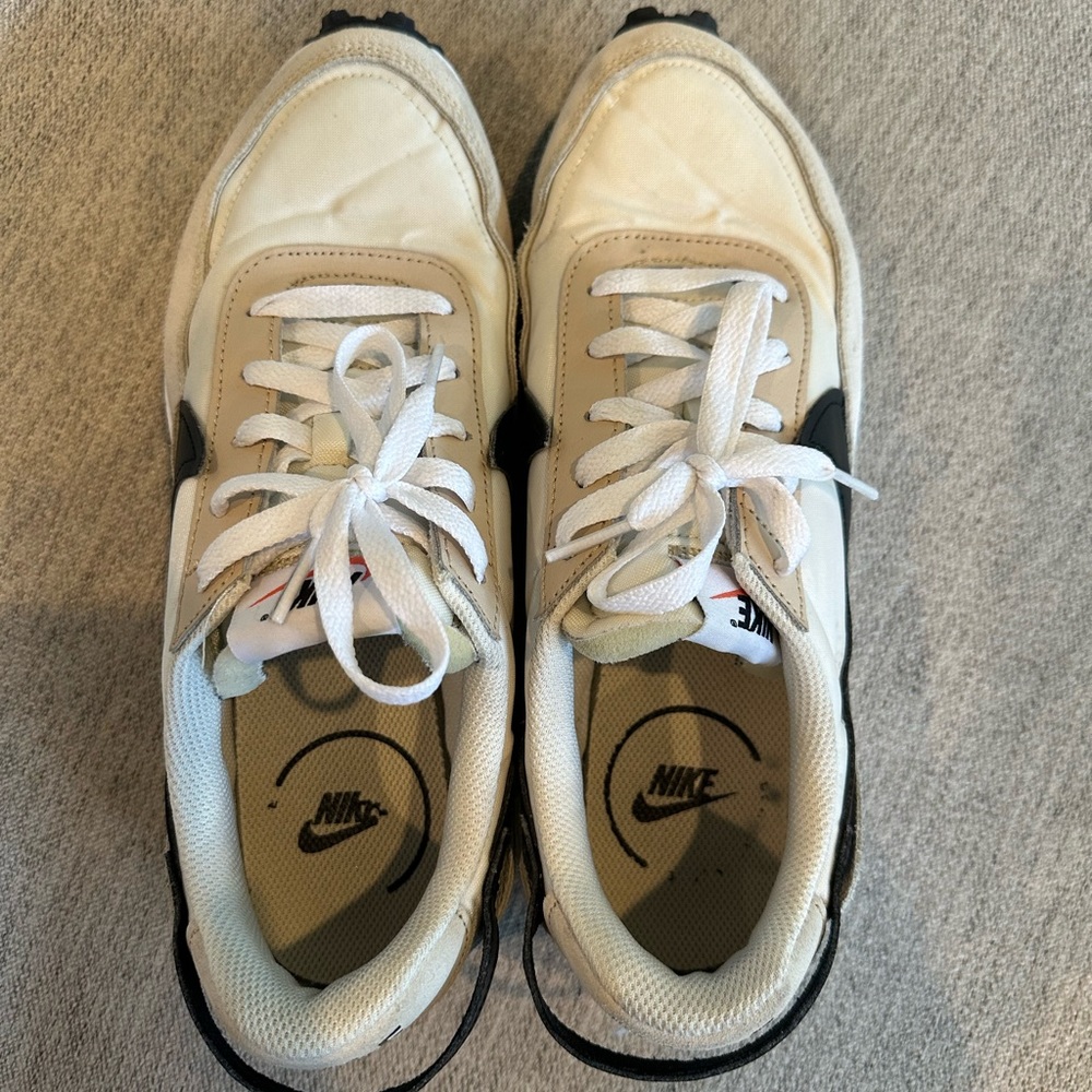 Size 10 women’s cream colored Nikes